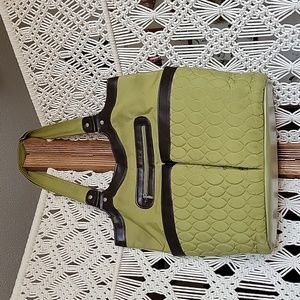 Lug green quilted bag. Snap top closure Brown trim. Great condition.